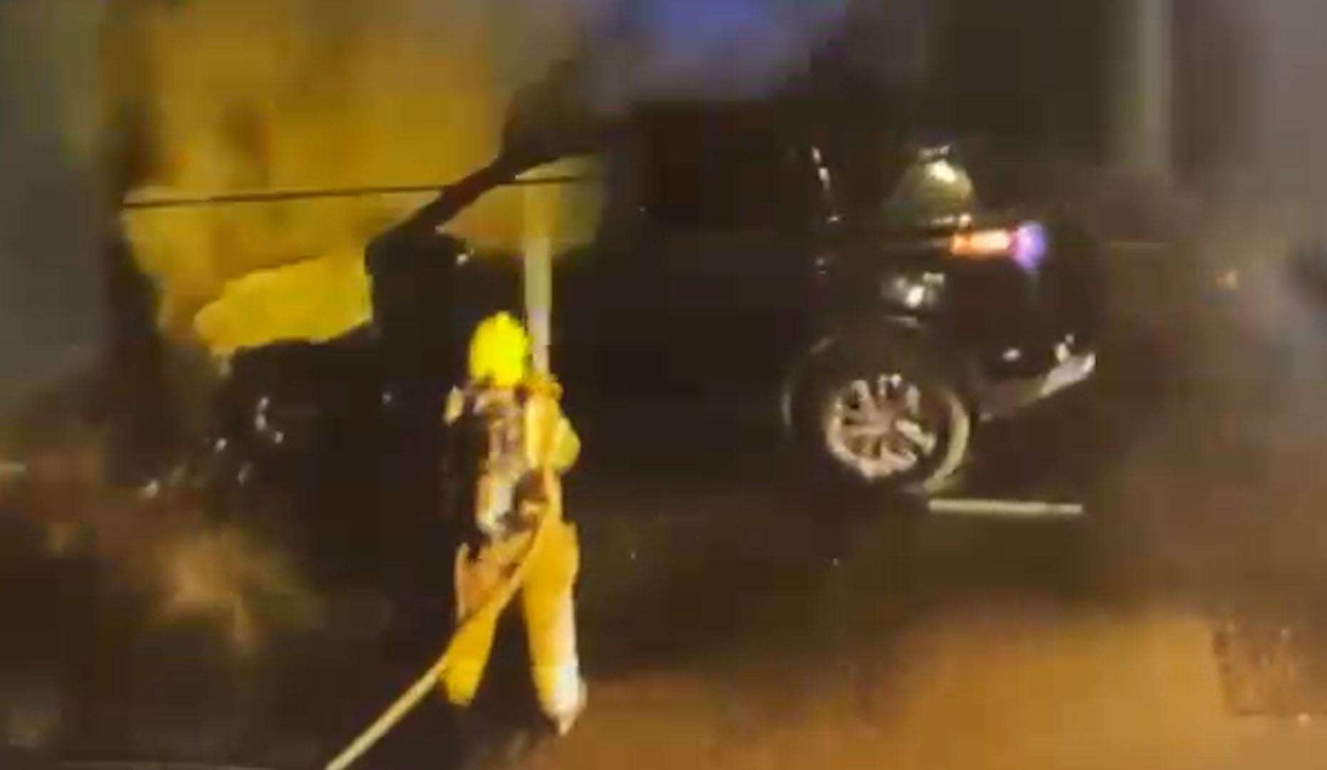 Screengrab from a video of firefighters tackling a burning car in the same north London street where Prime Minister Sir Keir Starmer has a property (Linda Perry/PA)