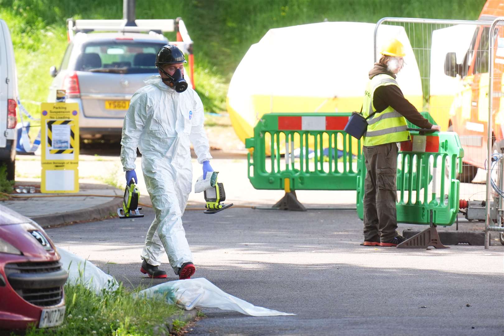 Part of Tillett Close remained cordoned off on Sunday morning (James Manning/PA)