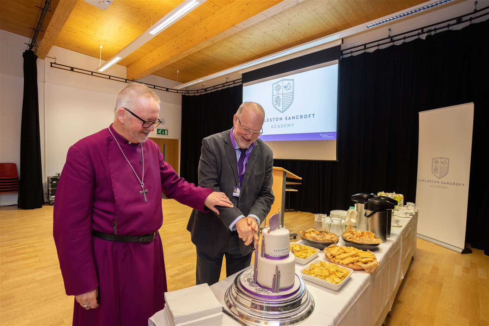 Rt Revd Alan Winton, Bishop of Thetford, was treated to cake during the opening ceremony. Picture: Jungle PR.