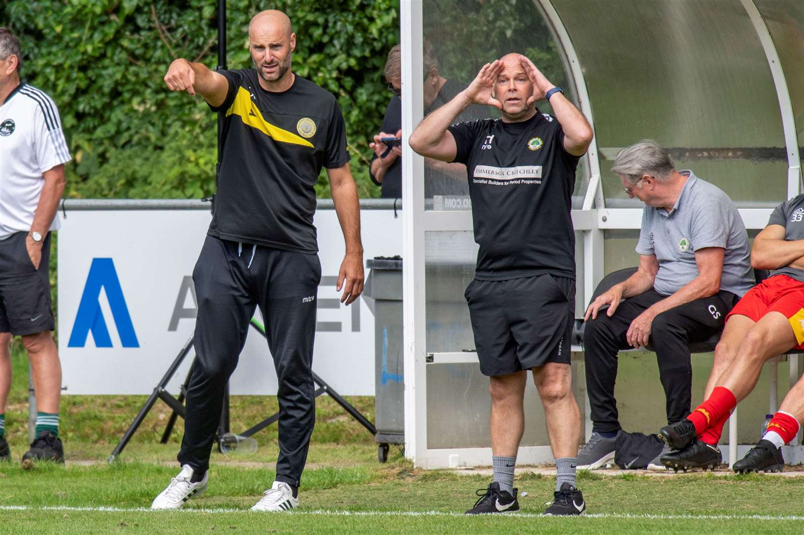 Walsham joint managers Chay Budd and Ian Hubbard in the dugout away at Lakenheath Picture: Mark Westley