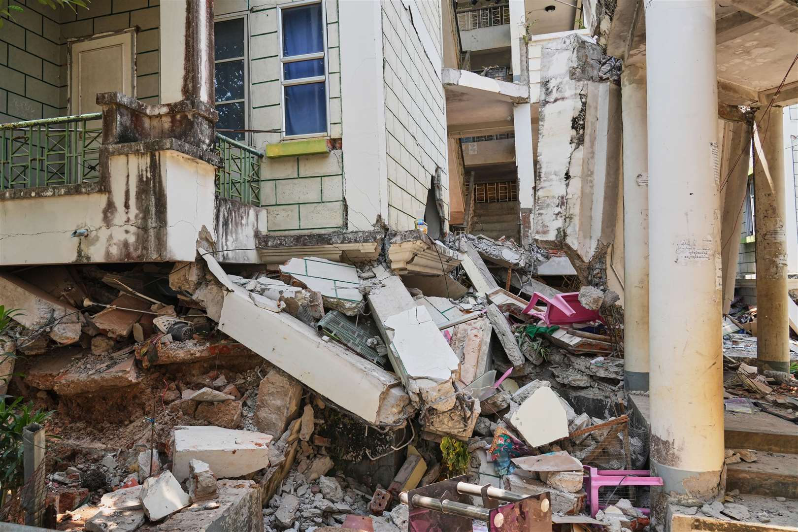 Damaged buildings are seen in the aftermath of last week’s earthquake in Naypyitaw, Myanmar (AP)