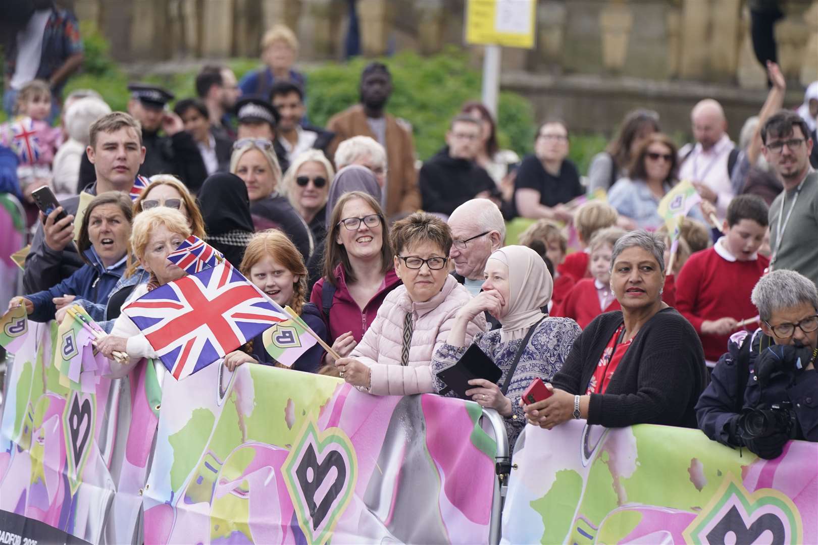 Wellwishers await the arrival of Charles and Camilla in Bradford (Danny Lawson/PA)