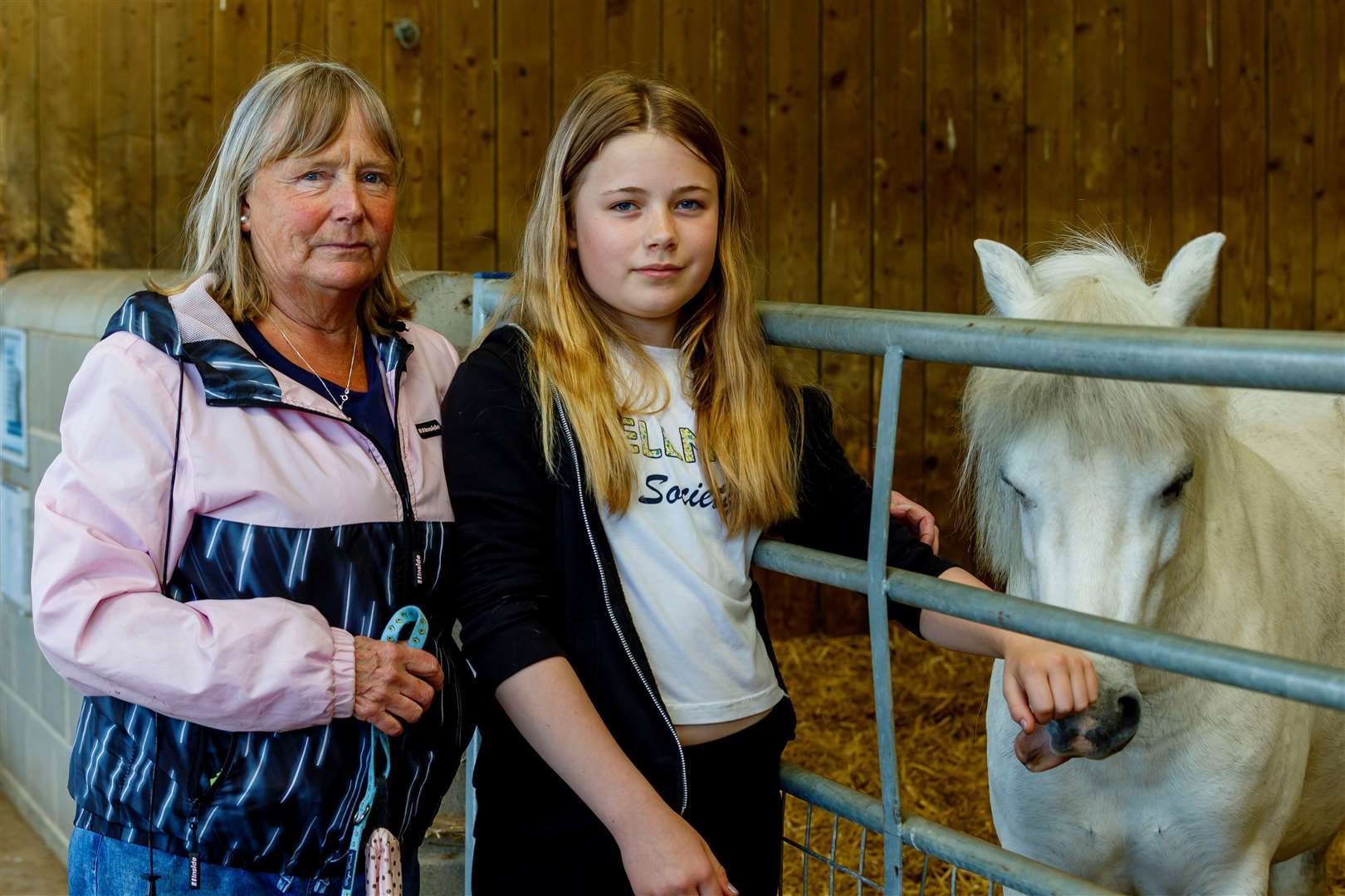 Gill Walker and Lily Tappin with Shadow. Picture: Mark Bullimore