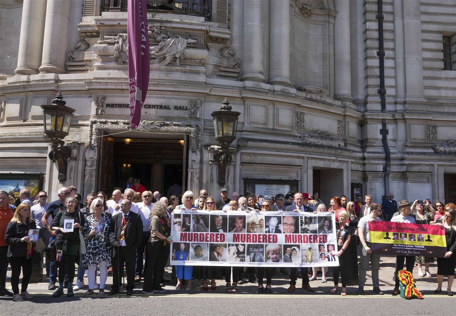 Victims and campaigners outside Central Hall in Westminster, London, after the publication of the Infected Blood Inquiry report in 2024 (PA)