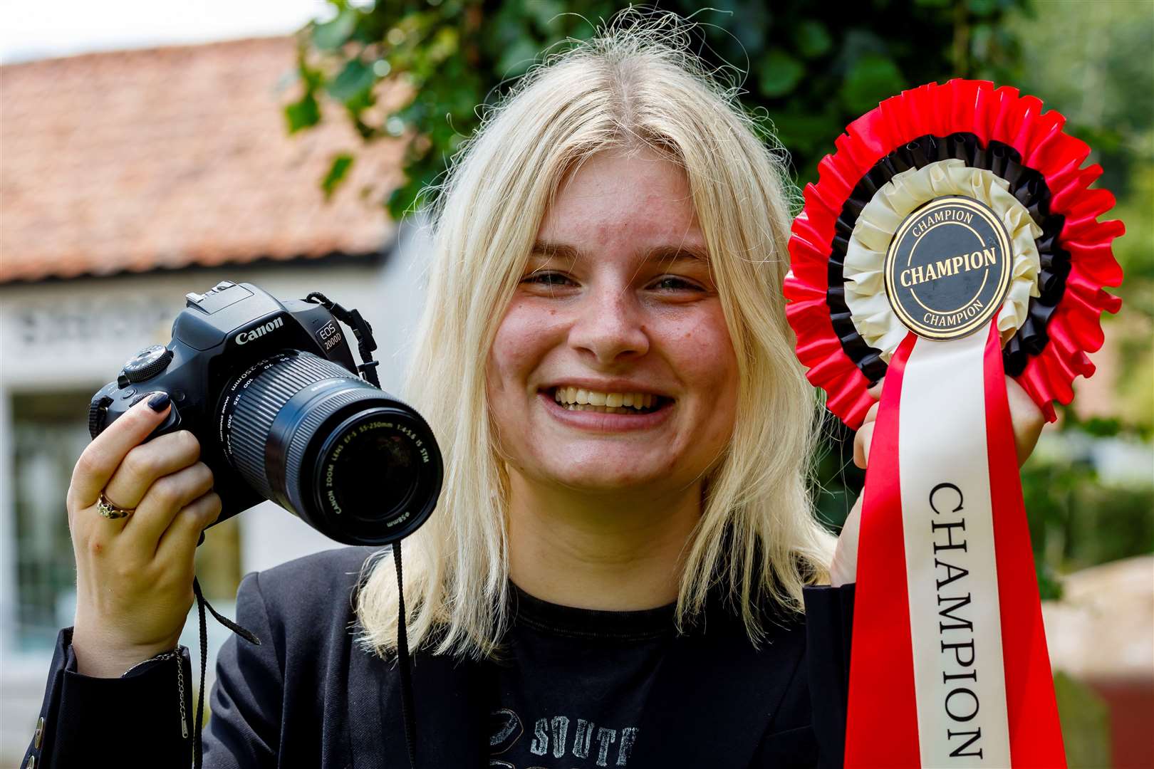 Johanna Barnett, organiser of the dog show at the event and also the photographer for the winners. Picture: Mark Bullimore