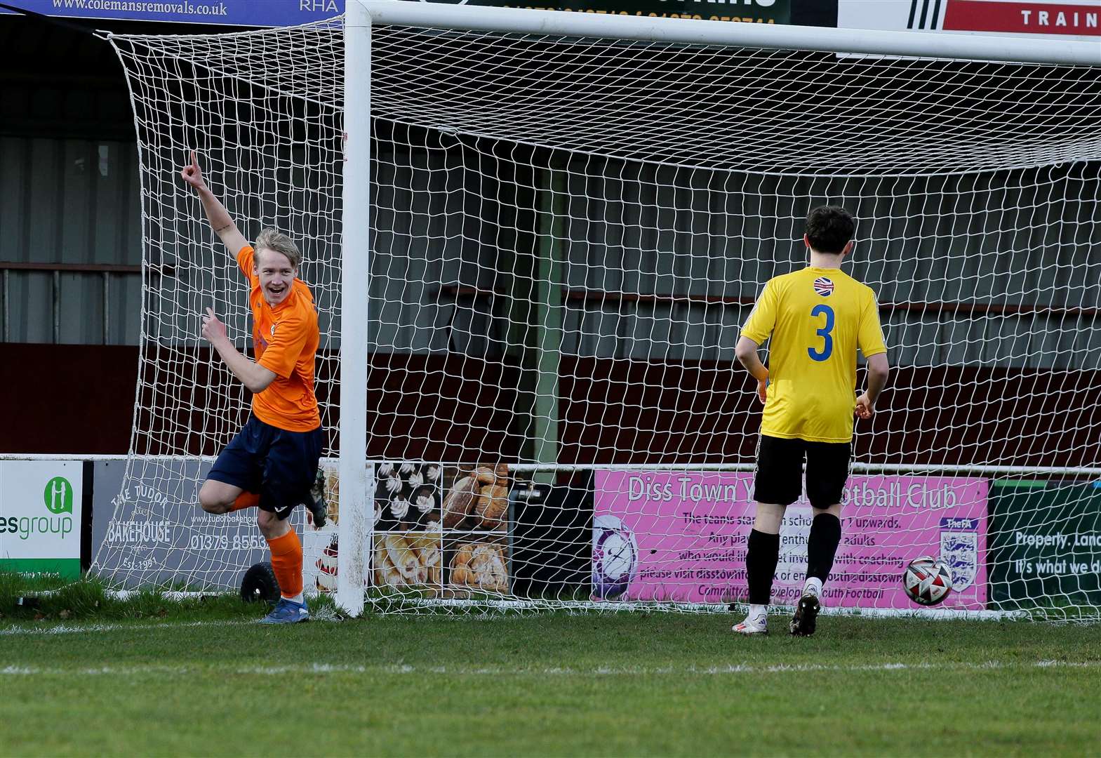 Malachi Wright wheels away to celebrate his sixth-minute opener for Diss Town on Saturday Picture: Mark Bullimore