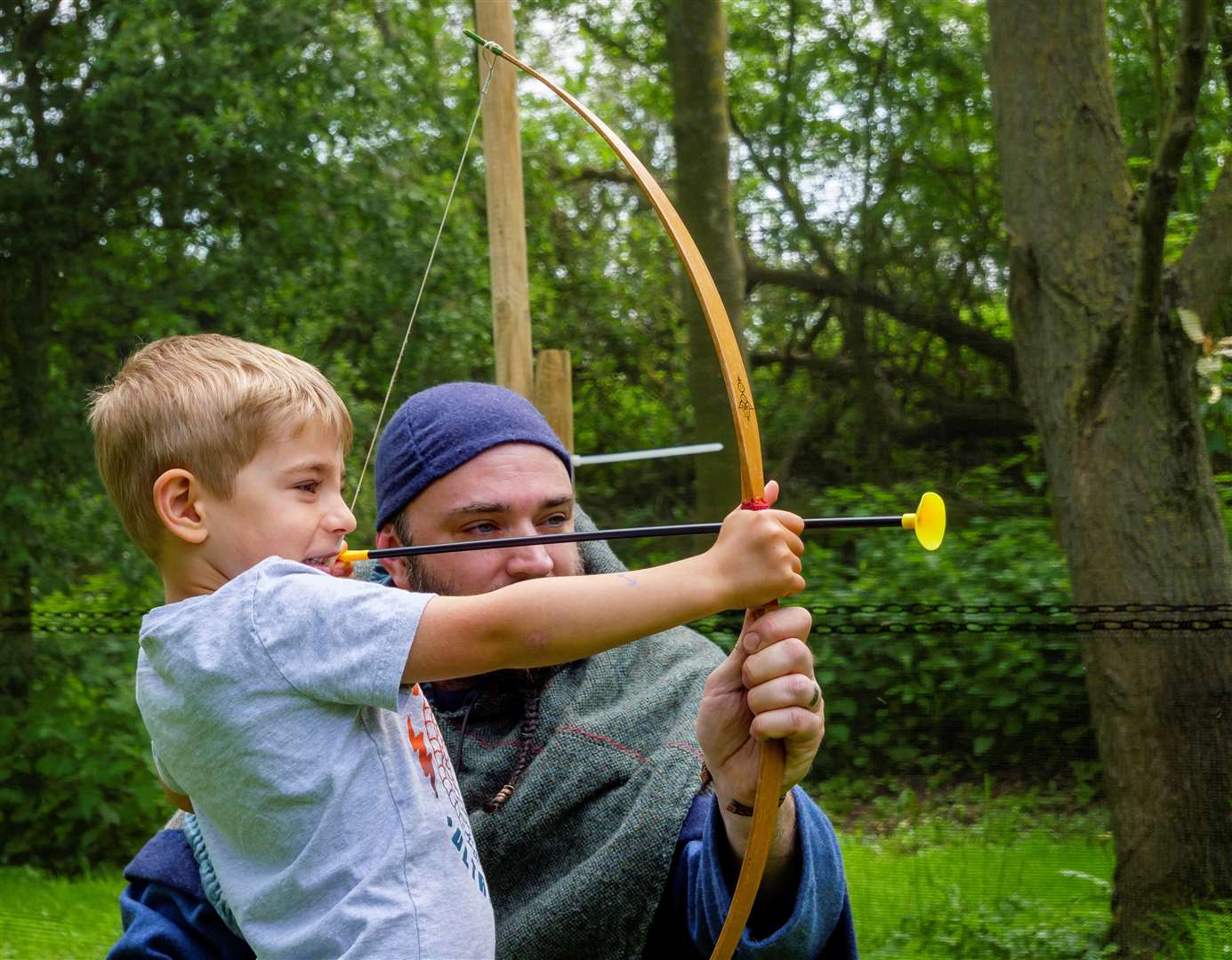 Thomas Goldspink trying his hand at archery during the Viking Day. Picture: Mark Bullimore