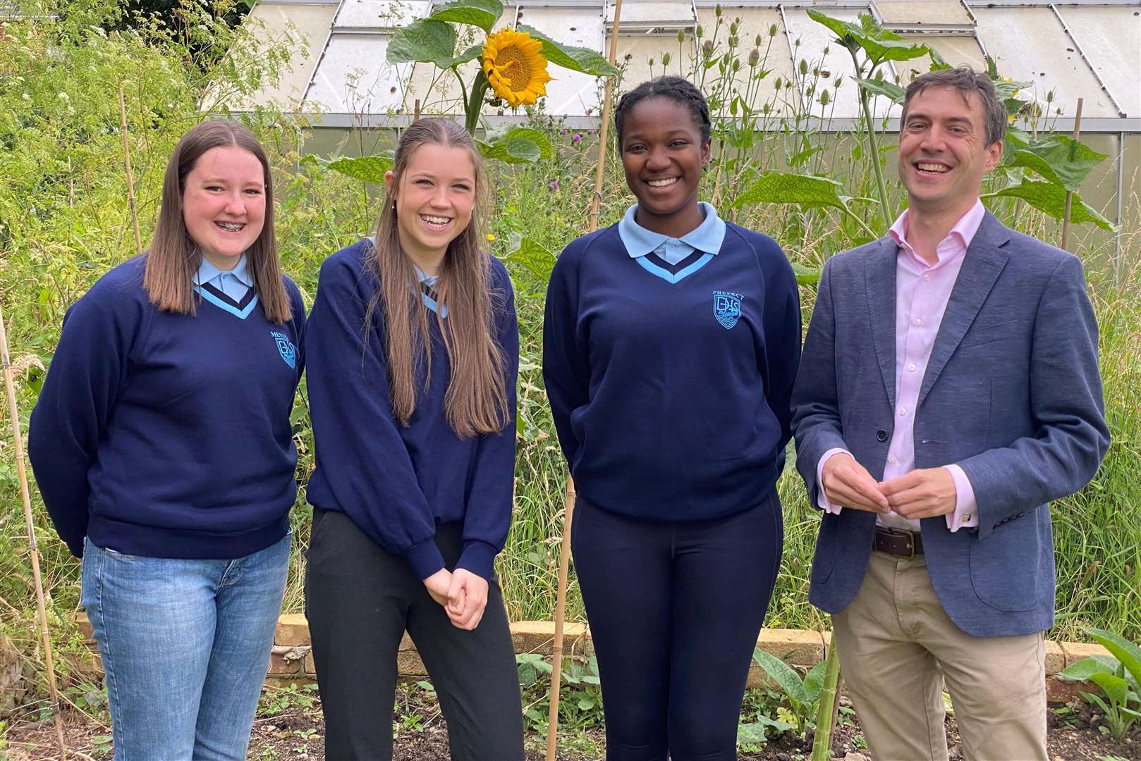 Diss High School Year 10 students Abi G, Zerayah A and Neve M with Adrian Ramsay. Picture: Green Party