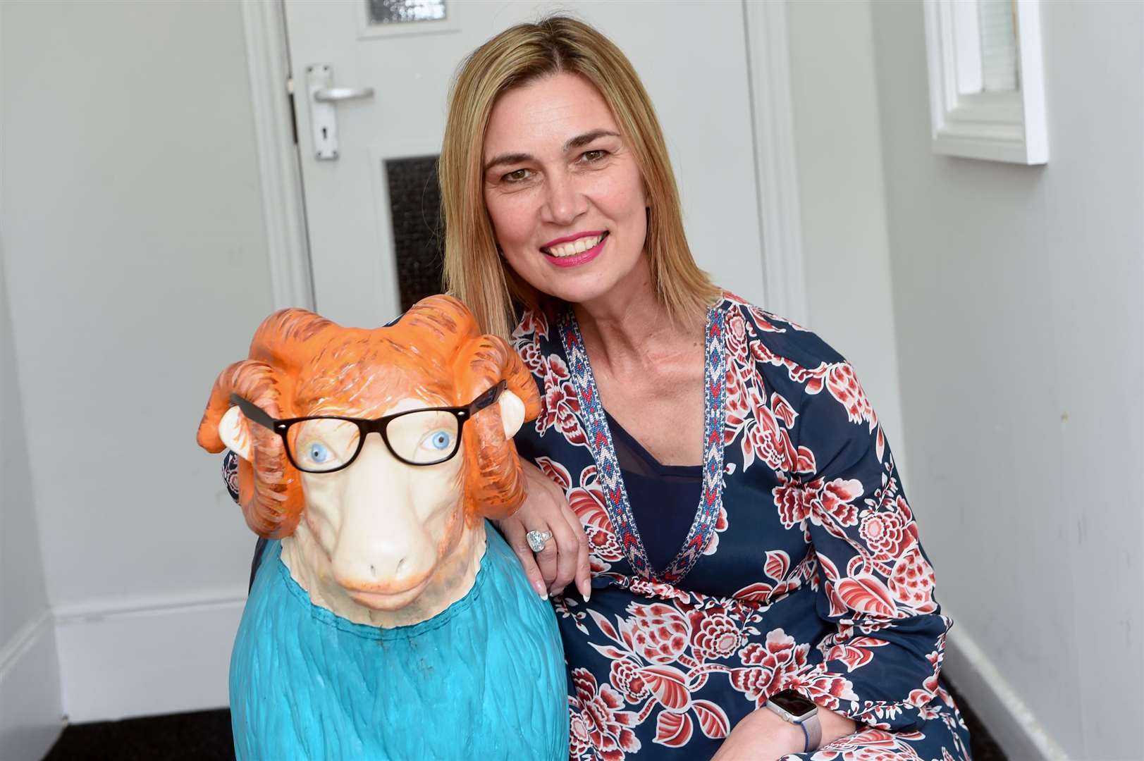 Artist Amanda Church with the sheep she designed. Picture by Mecha Morton.