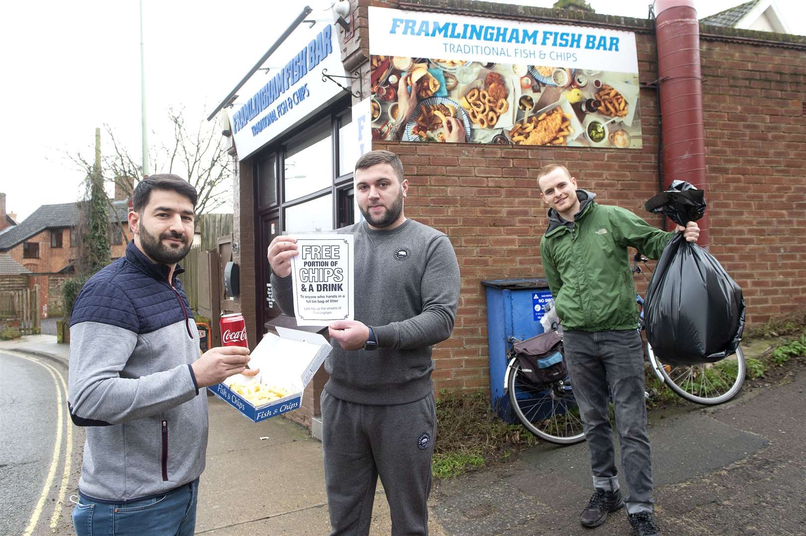 Framlingham Fish Bar is offering free chips and a drink to anybody who collects litter and drops it off in their outside bin...Pictured: Owner Huseyin Kabala, Yasin Kabala and William Taylor (Member of Fram litter group)...Picture by Mecha Morton
