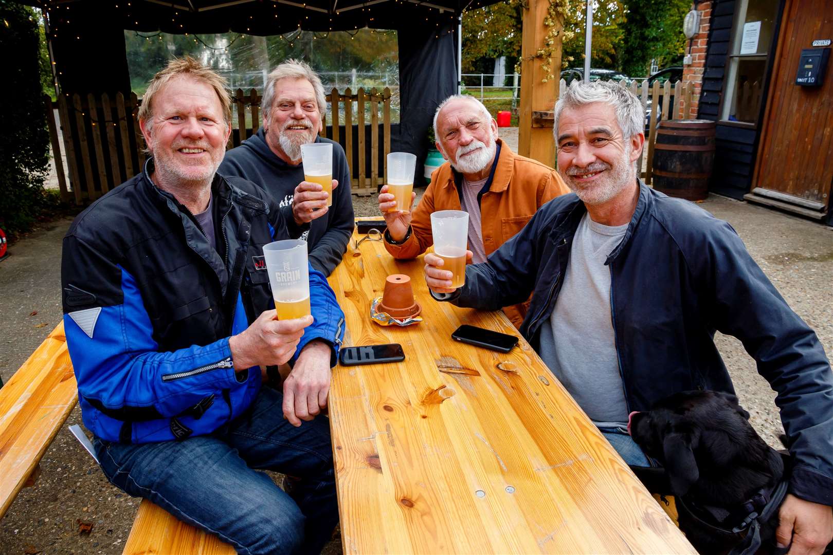 Simon Pickle, Ian McPherson, Martyn Lane and Hugh Coggles with Dolly enjoy a tipple. Pictures: Mark Bullimore.