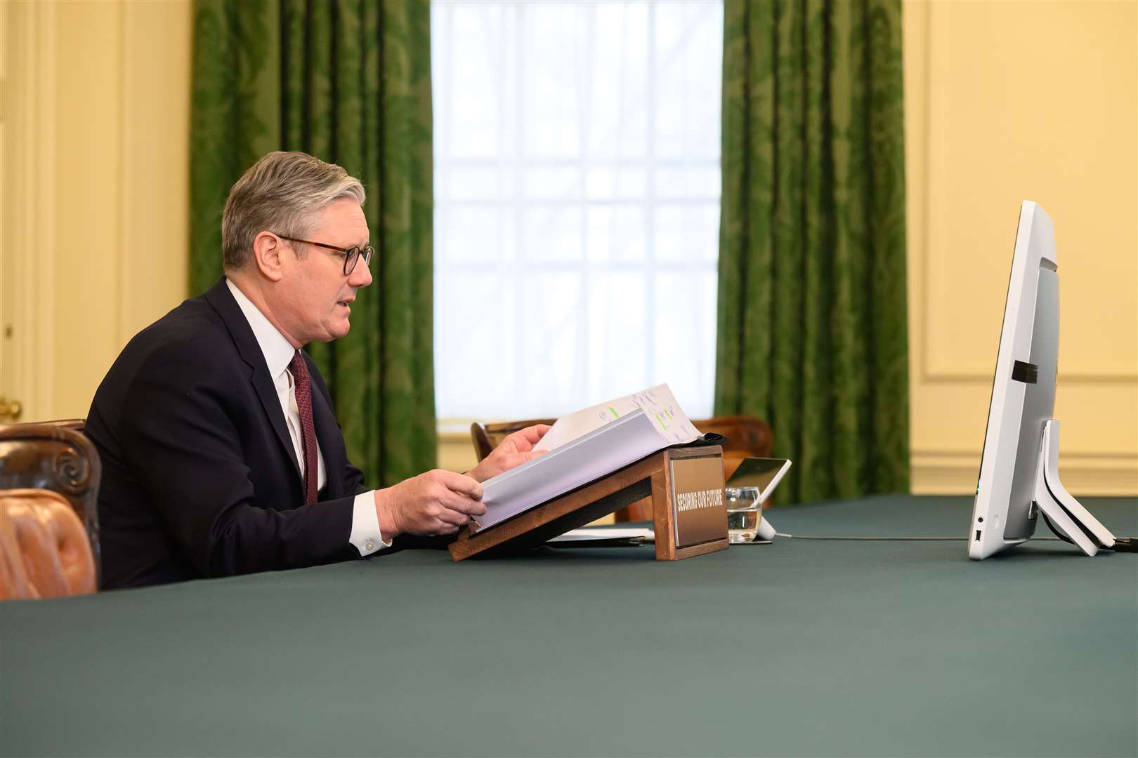 Sir Keir Starmer hosts the video conference call with world leaders (Leon Neal/PA)