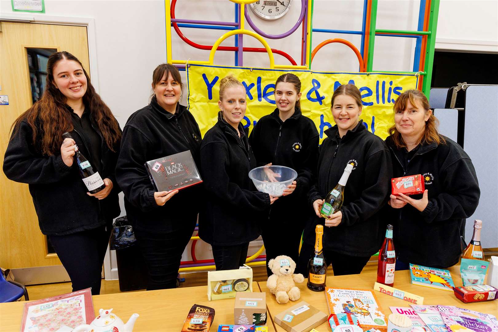 Members of the pre-School team – Lydia Logan, Hannah Sinclair, Charlotte Bloomfield, Kaitlin Musk, Jess Southey and Julie Lanchester with the tombola. Picture: Mark Bullimore