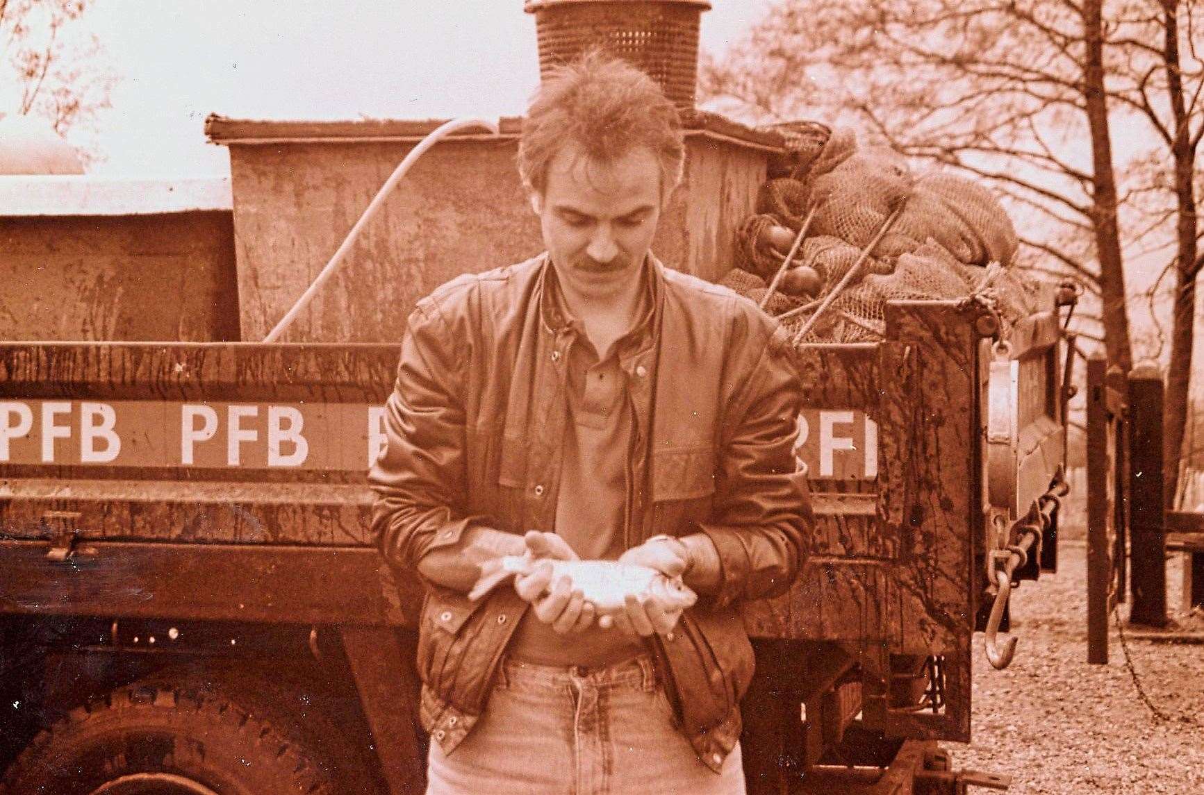 Stocking more roach at West Stow CP Lake in March 1992. Picture: Chris Boughton