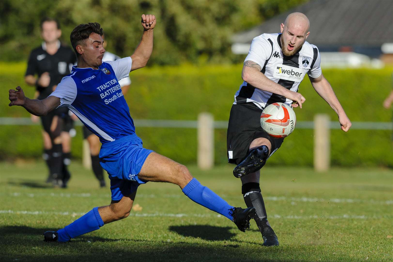 Harleston, Norfolk. 29 September 2018 ..Football action from Harleston v Cornard - Harleston's K Bauer and Cornard's L Brennan...Picture by Mark Bullimore Photography. (4483712)