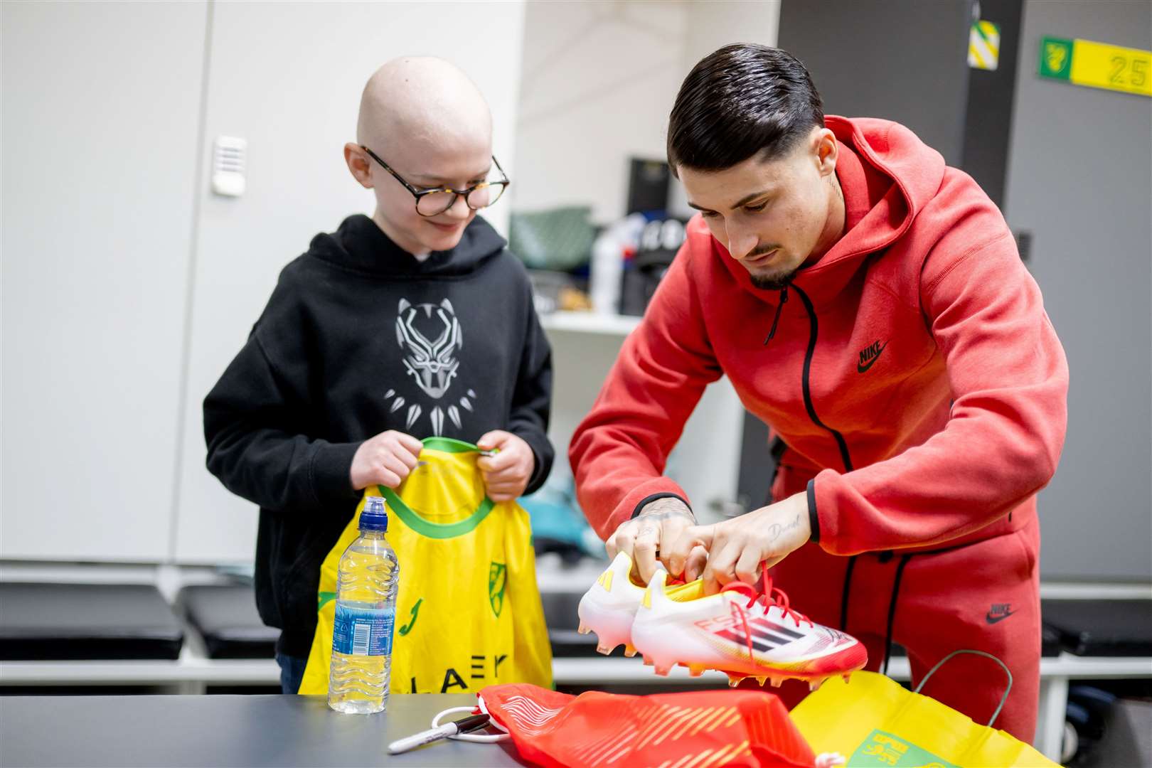 Albert Shaw was given a signed shirt and football boots by the Norwich City star. Pictures: Norwich City/Matthew Usher