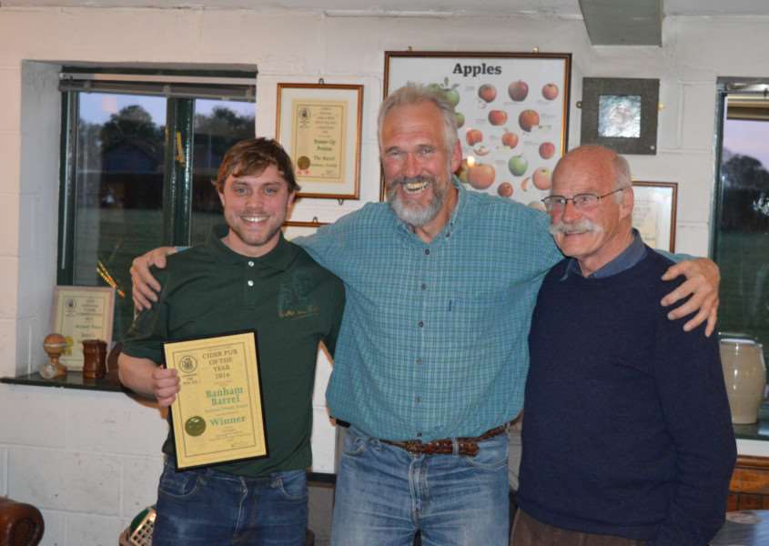 From left: Banham Barrel tenant Frank Foster-Wright receives the Mid Anglia CAMRA Cider of the Year Award from the branch's Cider Officer Ken Woolley and branch Chairman David Williamson.