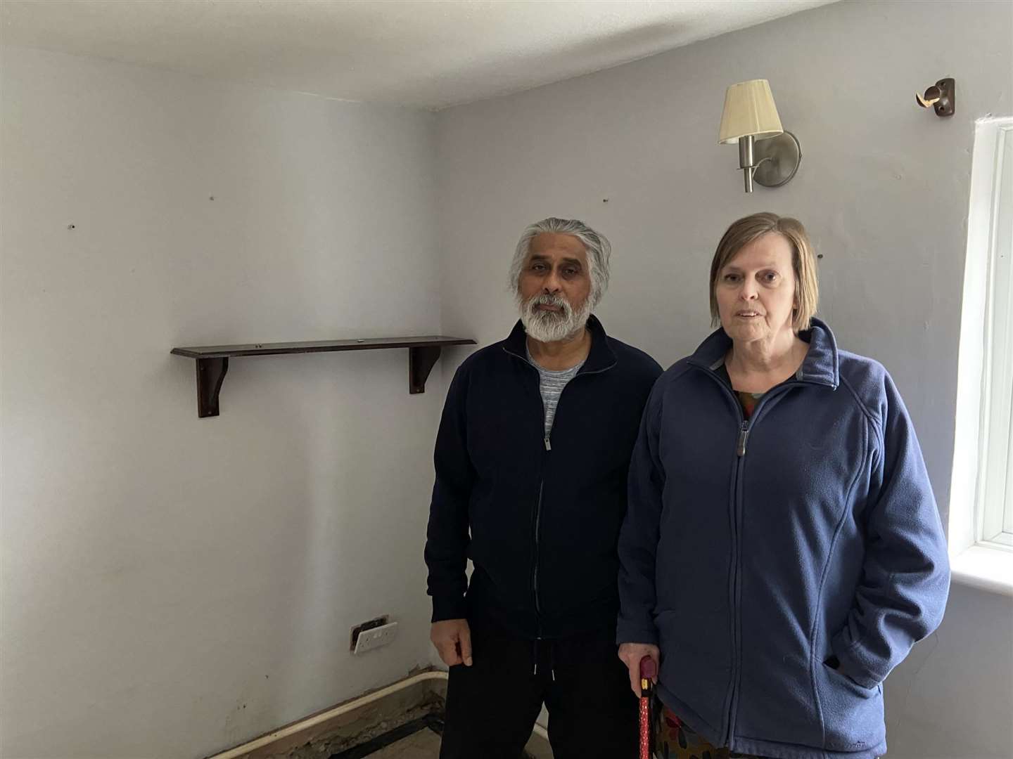 Hans and Lynn Shortt in their home that was badly damaged in October 2023 in the Storm Babet floods. Picture: Owen Sennitt