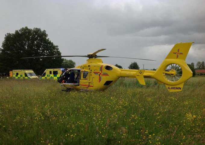 Land amulances and the East Anglian Air Ambulance at the scene of the crash in Old Buckenham ANL-150622-132308001
