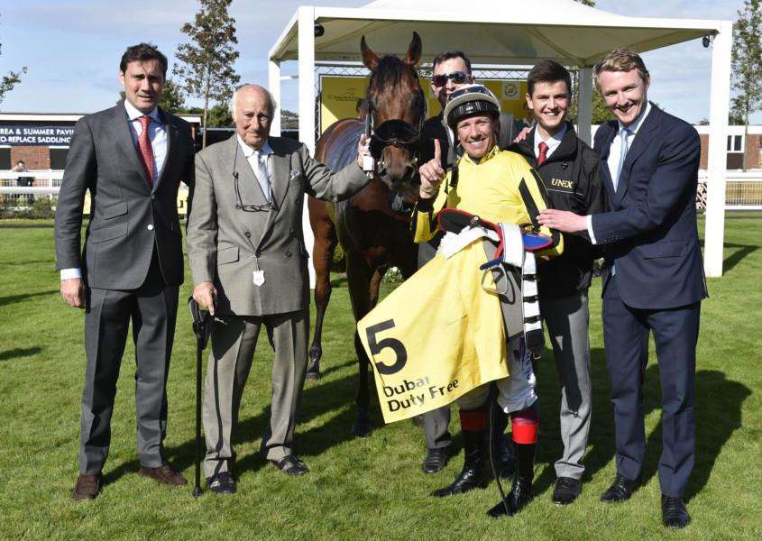 FAMILY OCCASION: George Scott, the Gredleys and Frankie Dettori celebrate James Garfield's win at Newbury last year. Picture: Newbury Racecourse