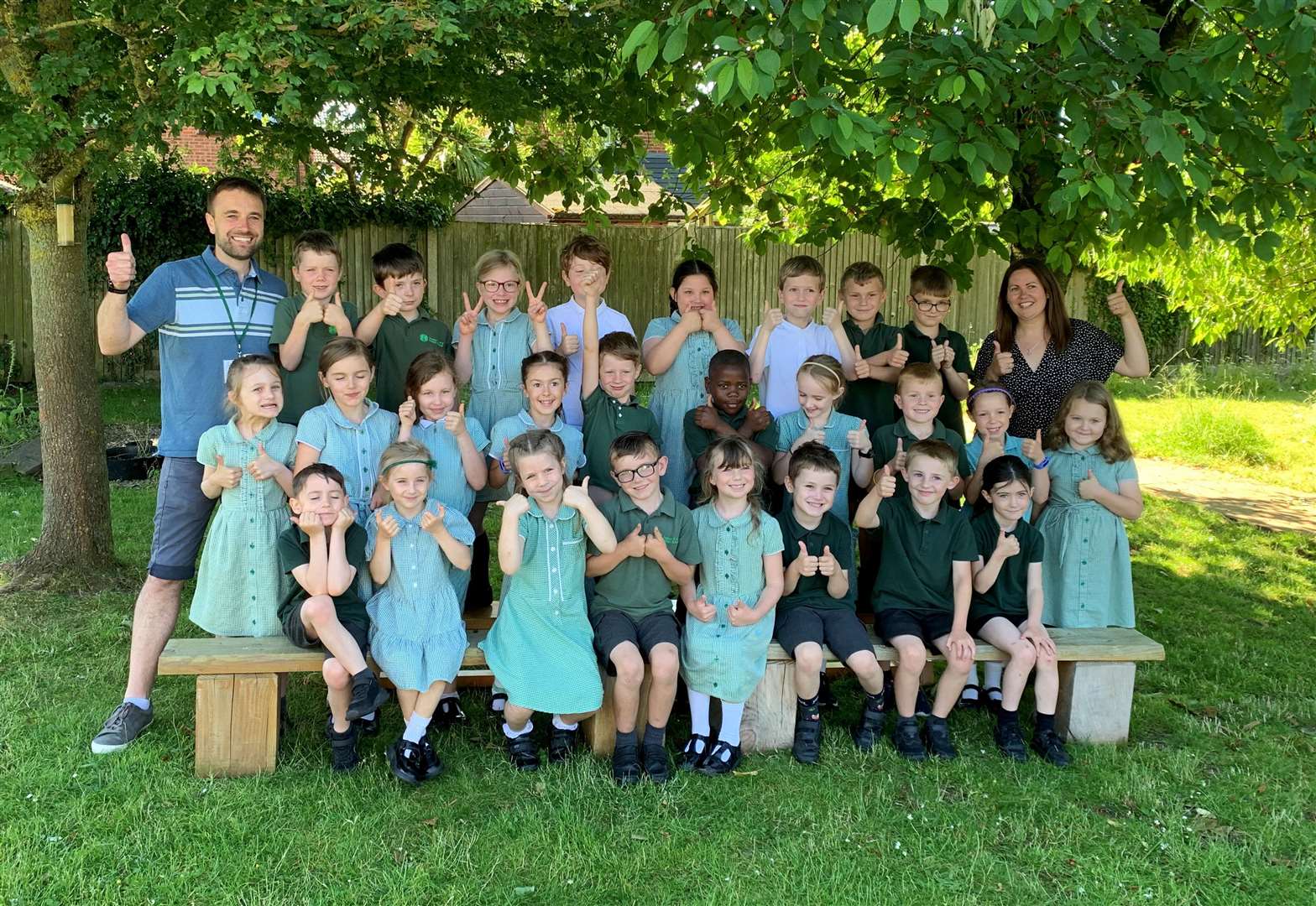 Preston CE VC Primary School's executive headteacher Matt Walker and head of school Jo Firman with some of its pupils.