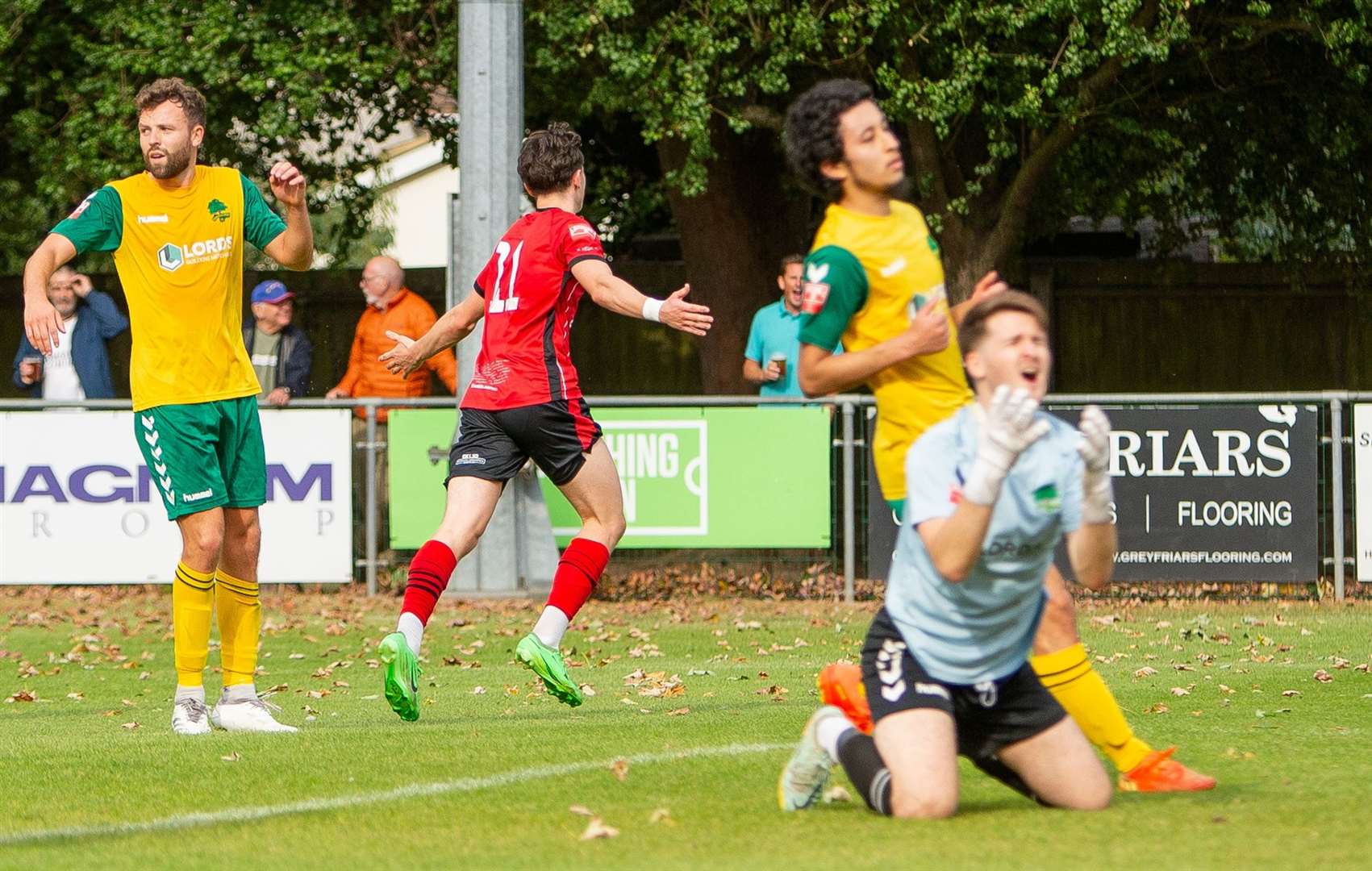 Hat-trick hero Charlie Warren wheels away after scoring his third for Felixstowe Picture: Stefan Peck