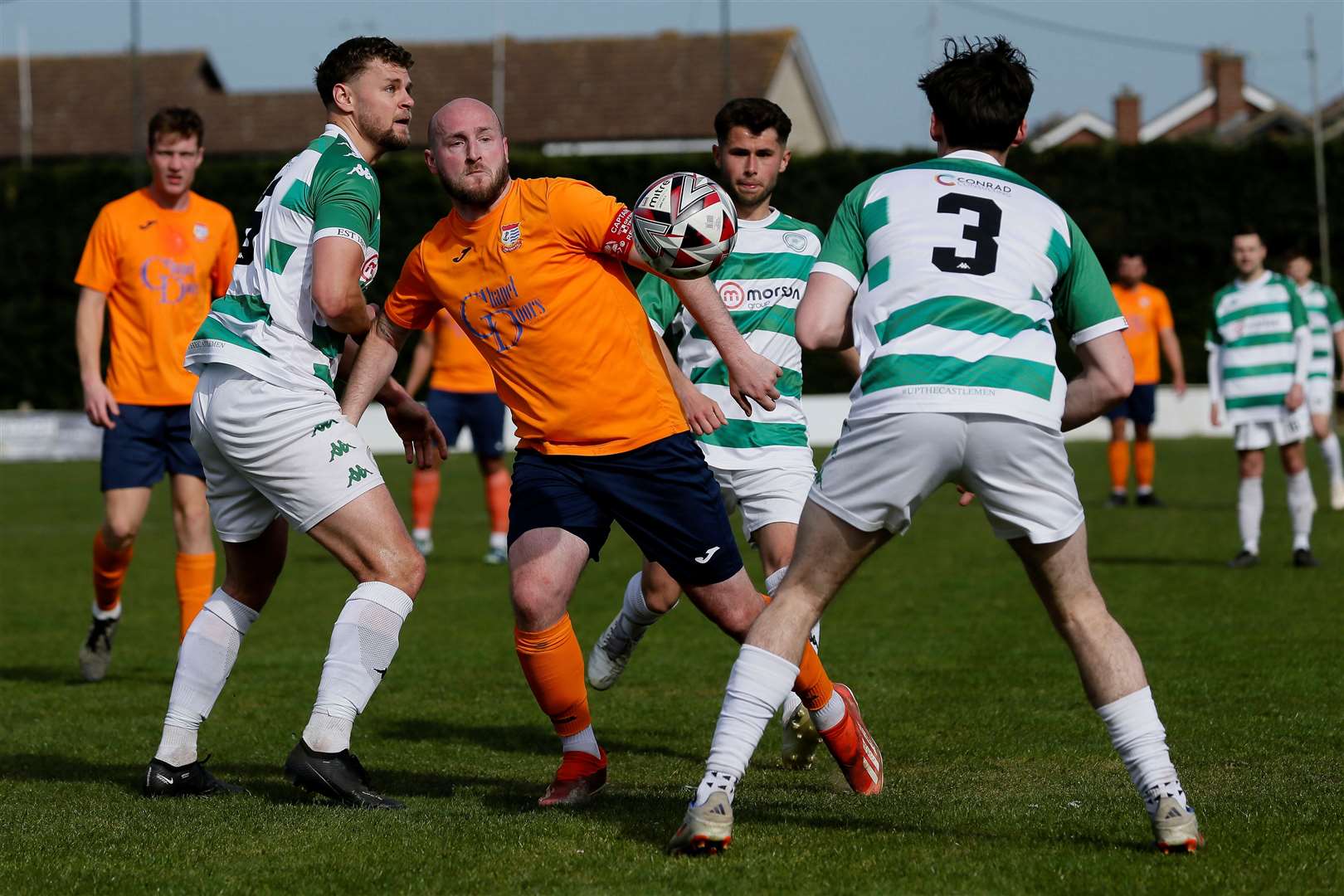 Diss skipper Kyle Baker battles for possession against Framlingham. Picture: Mark Bullimore