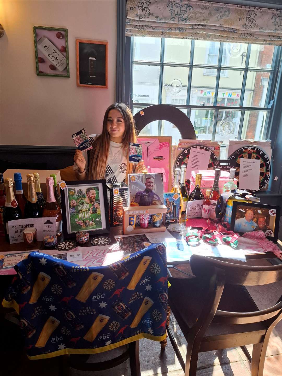 Caitlin Hirst, manning the raffle stall.