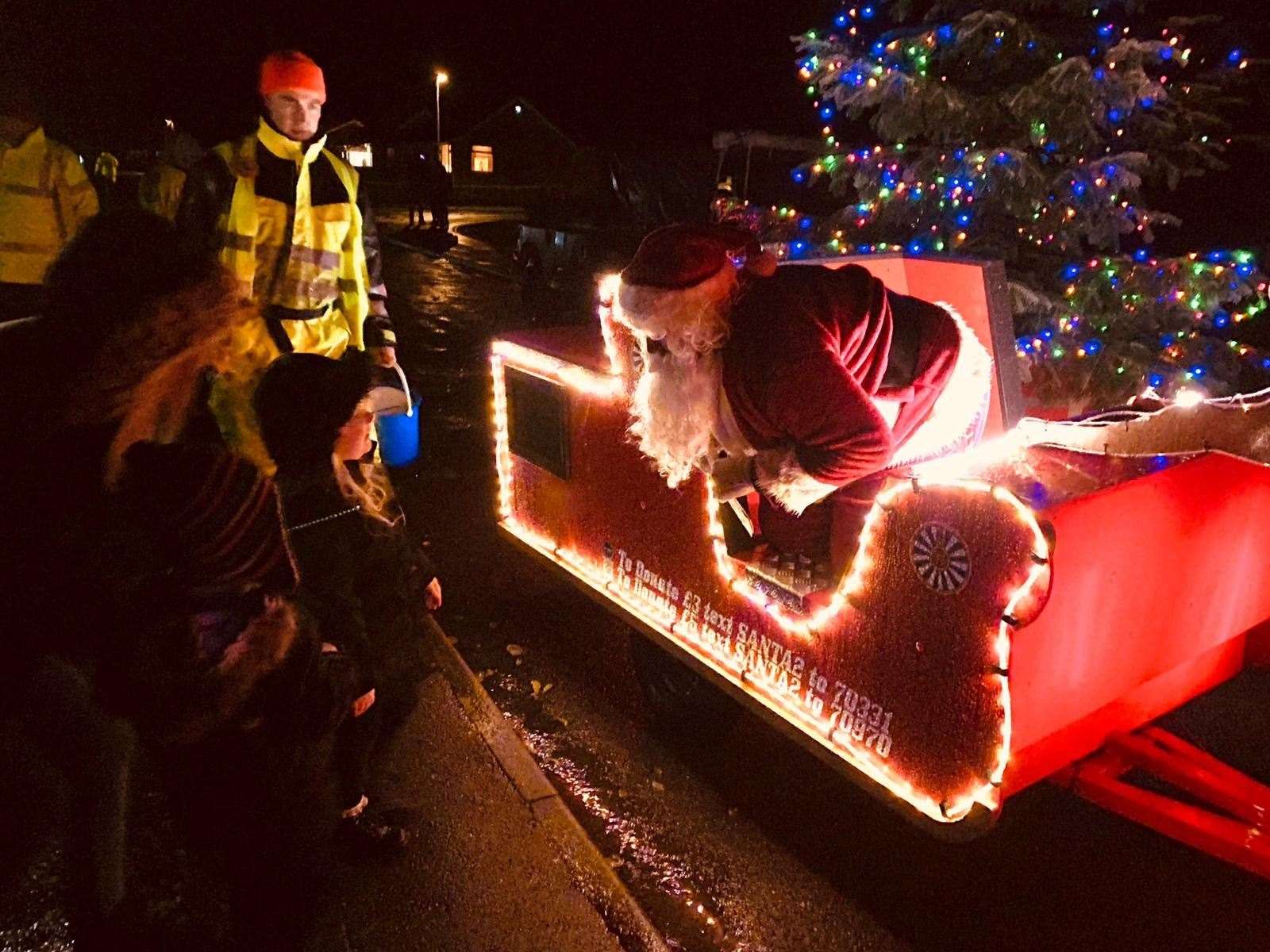 Another Santa sleigh, organised by the Harleston Round Table, made its way through the town earlier this month. Picture: Rob Vincent. (53947576)