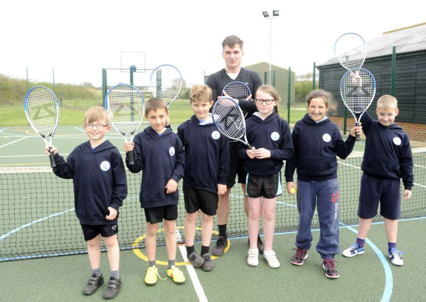 Tennis Coach Mr Lameroux, coaching kids from Mendham and St Edmunds Primary schools.