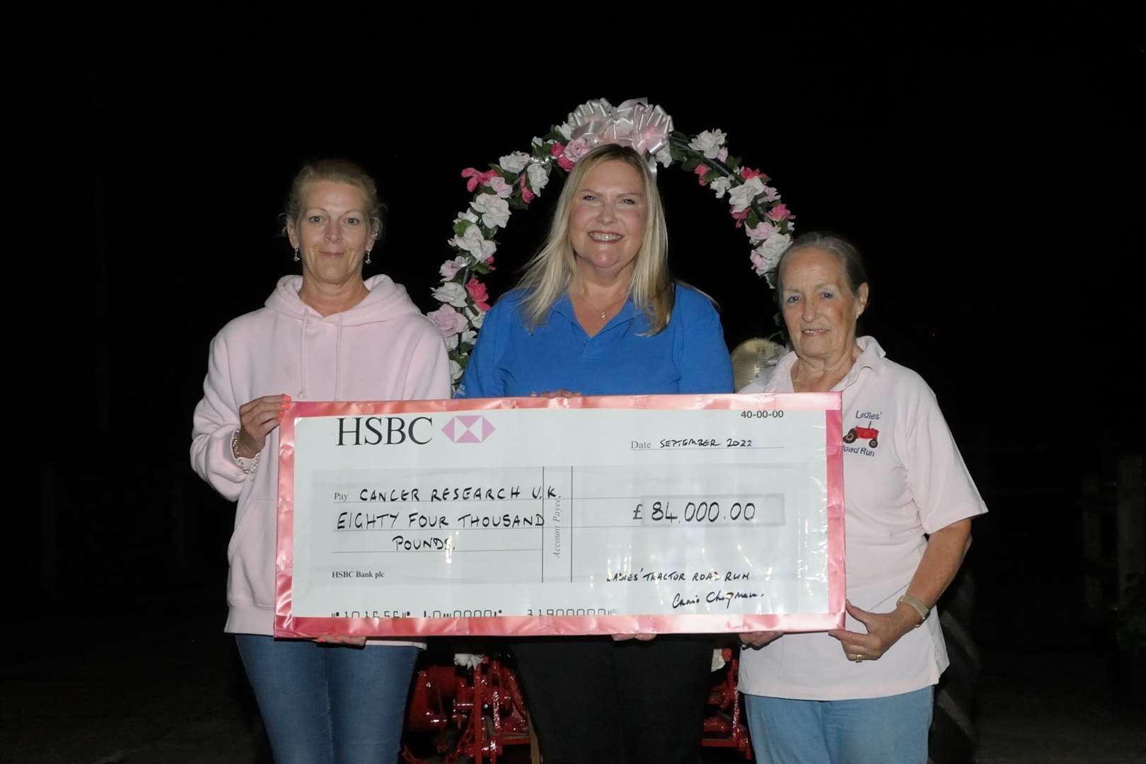 Left to Right: Sara Curtis (Pink Lady), Gill Burgess from Cancer Research UK and organiser Annie Chapman. Picture: Libby Searle.