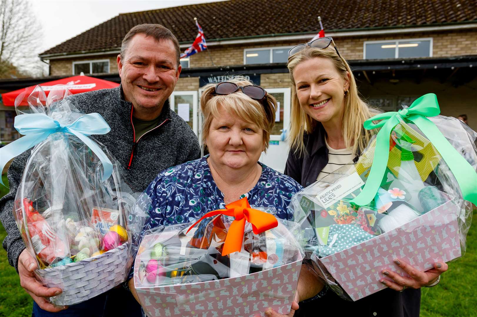 Martyn Dove, Bernie Blencowe and Jacqui Taylor Mayes with the raffle prizes. Picture: Mark Bullimore