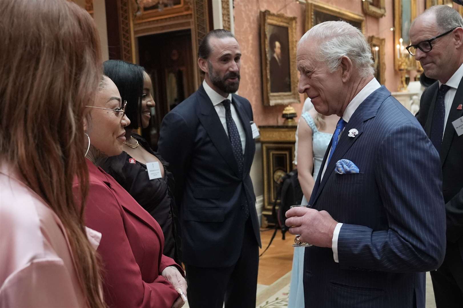 King Charles meets actor Joseph Fiennes and members of The Sugababes, during a reception for winners of the King’s Trust Awards 2025 at Buckingham Palace (Stefan Rousseau/PA)