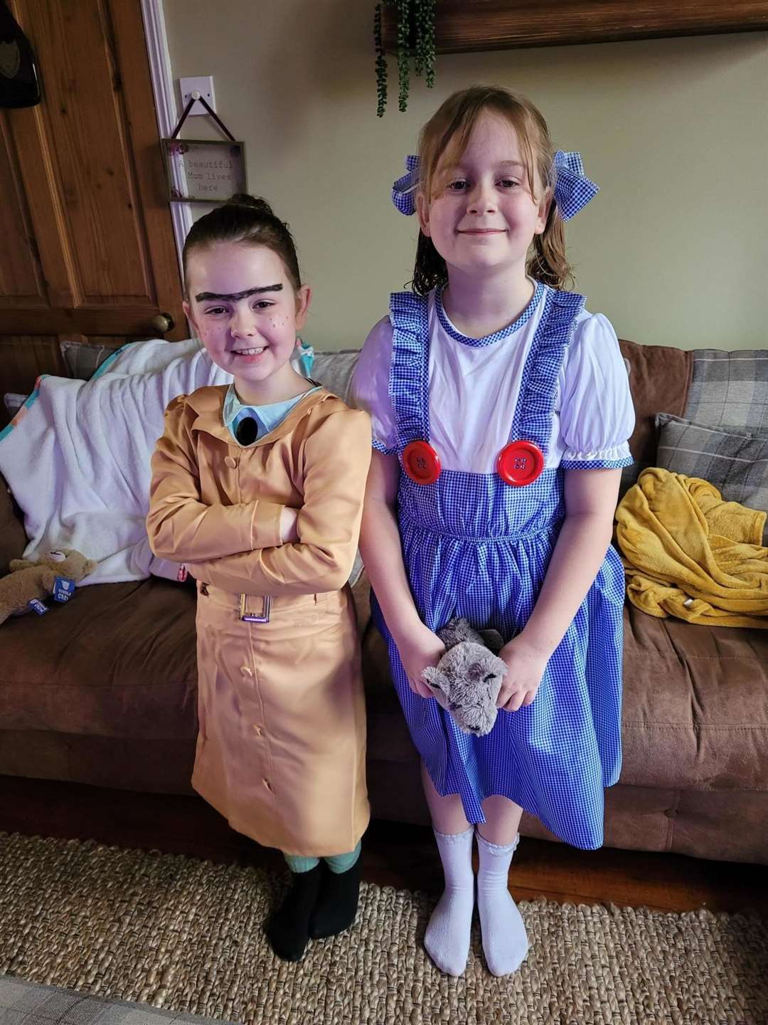 Lucy Barnard, eight, dressed as Mrs Trunchbull from Matilda and Megan Barnard, 10, dressed as Dorothy from Wizard of Oz - both from Attleborough.