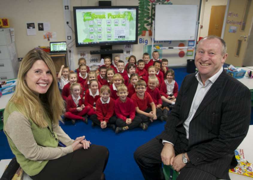 Dickleburgh, Norfolk. Dicklebugh Primary school which is in the top 2% of schools with 100% of pupils achieving the expected standard of phonic being taught at primary schools. pictured is class teacher Mrs Zoe�a MIllard and James Richards, headteacher ANL-141015-105013001