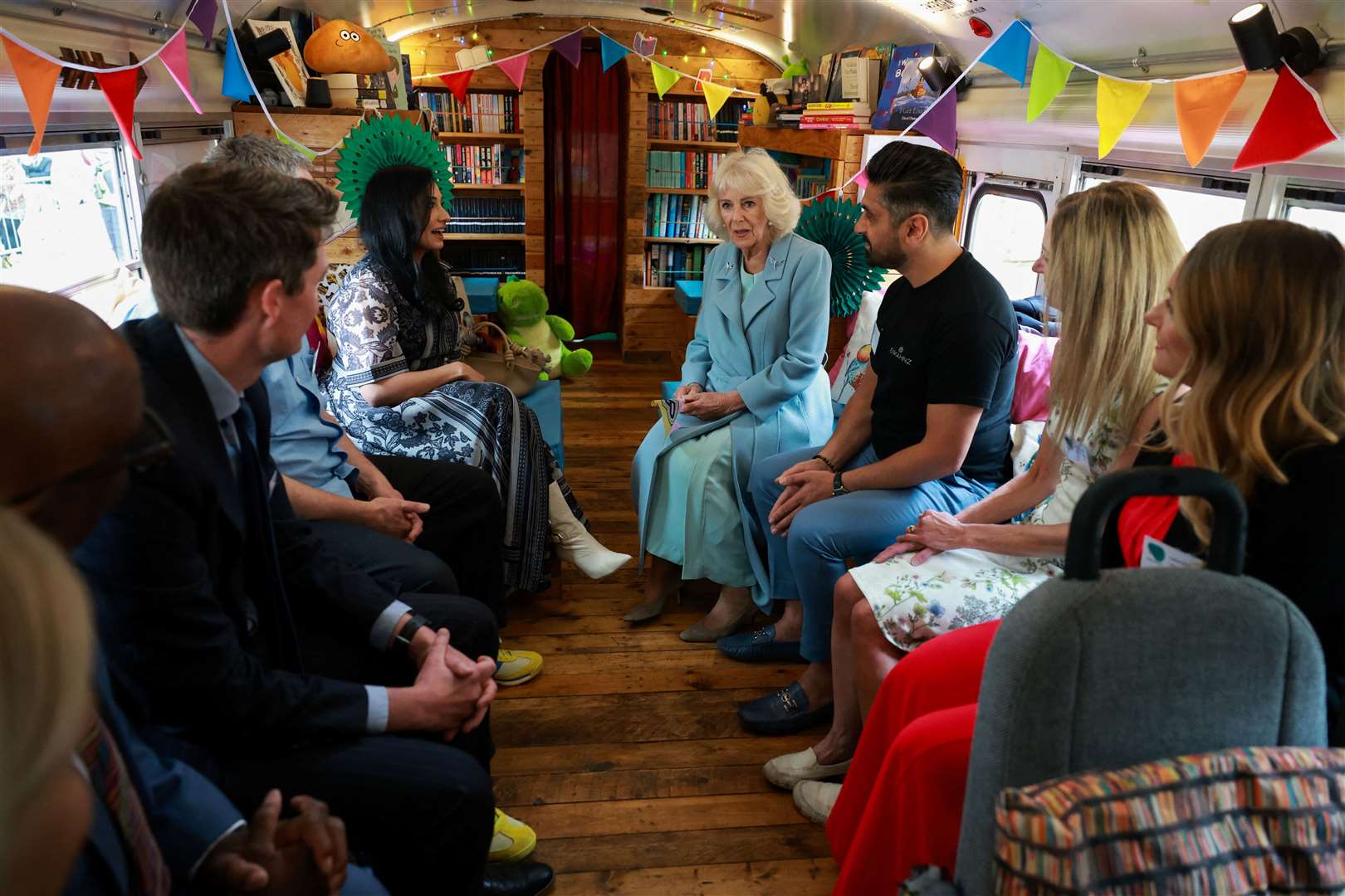 The Queen on the Bradford Stories Bus outside Fountains Church in Bradford (Phil Noble/PA)
