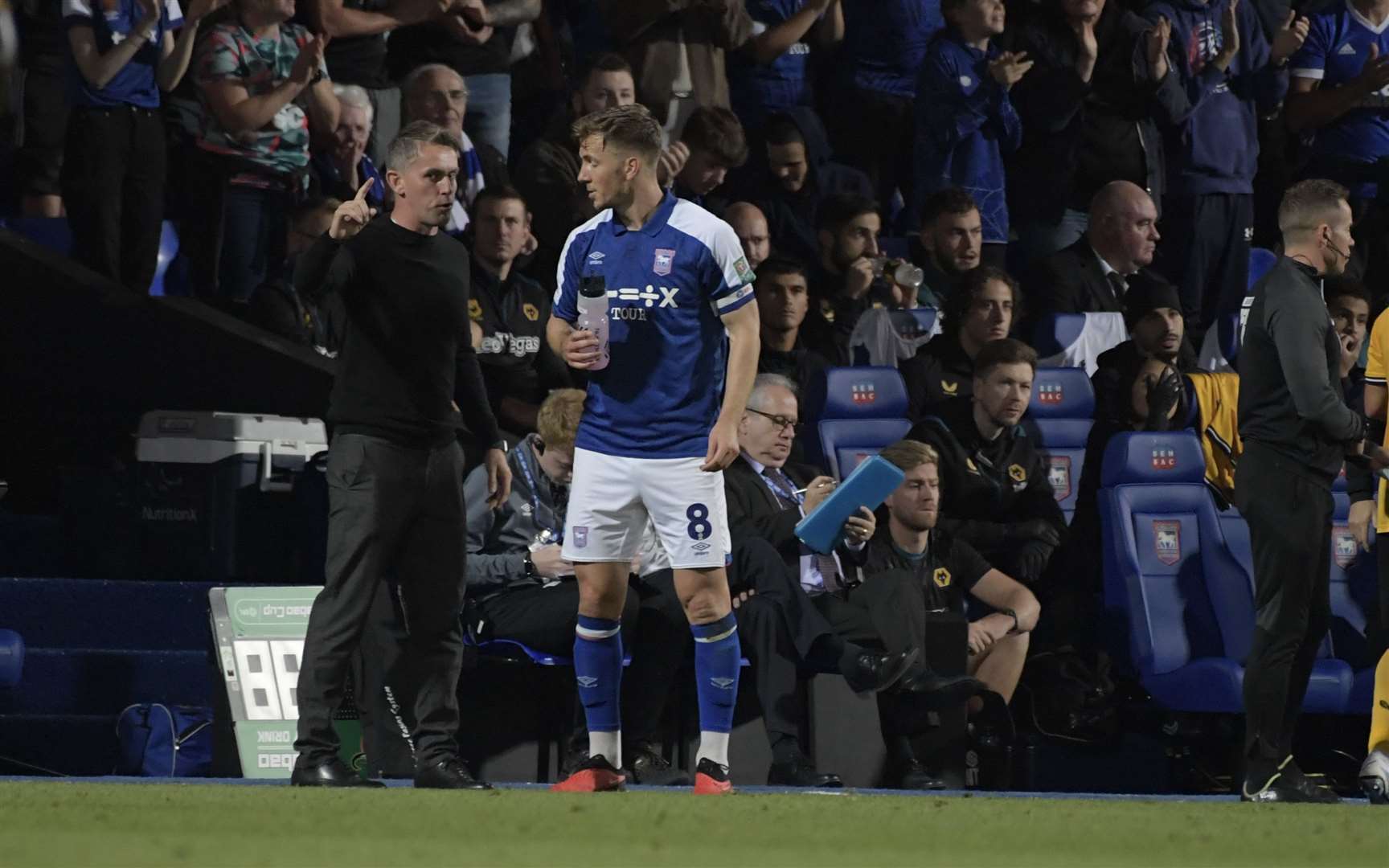 Ipswich Town manager Kieran McKenna gives instructions to captain-for-the-night Lee Evans during the Carabao Cup win against Premier League Wolves Picture: Barry Goodwin