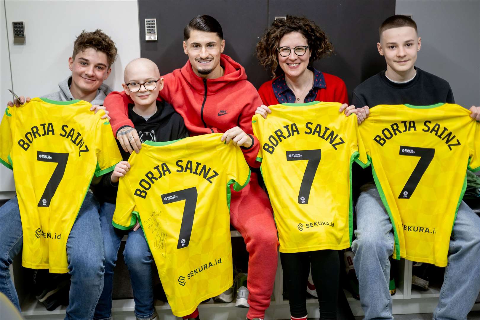 Albert, his mum and two older brothers with Borja. Pictures: Norwich City/Matthew Usher