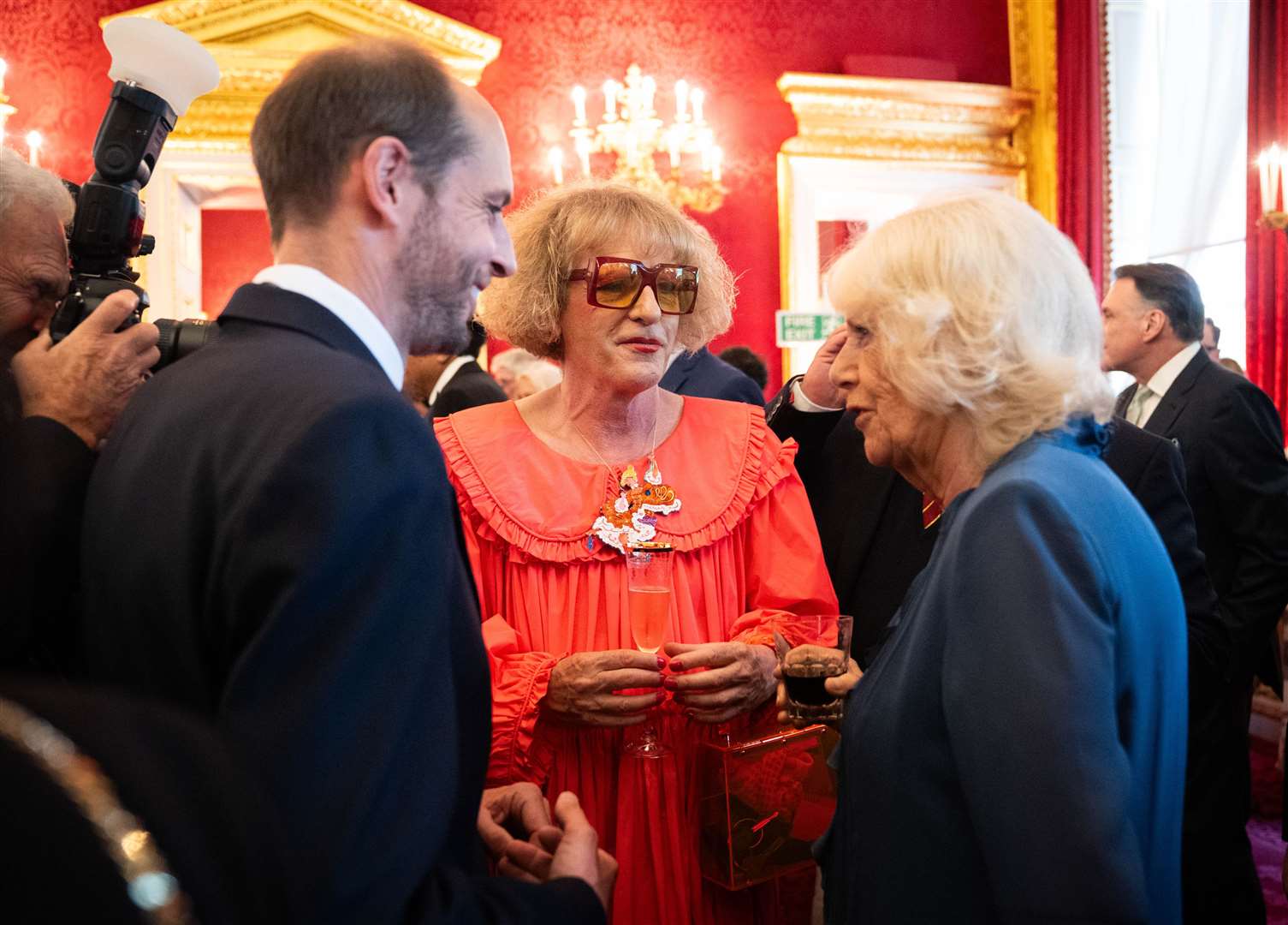 Queen Camilla speaks with Grayson Perry, centre, during the reception (James Manning/PA)