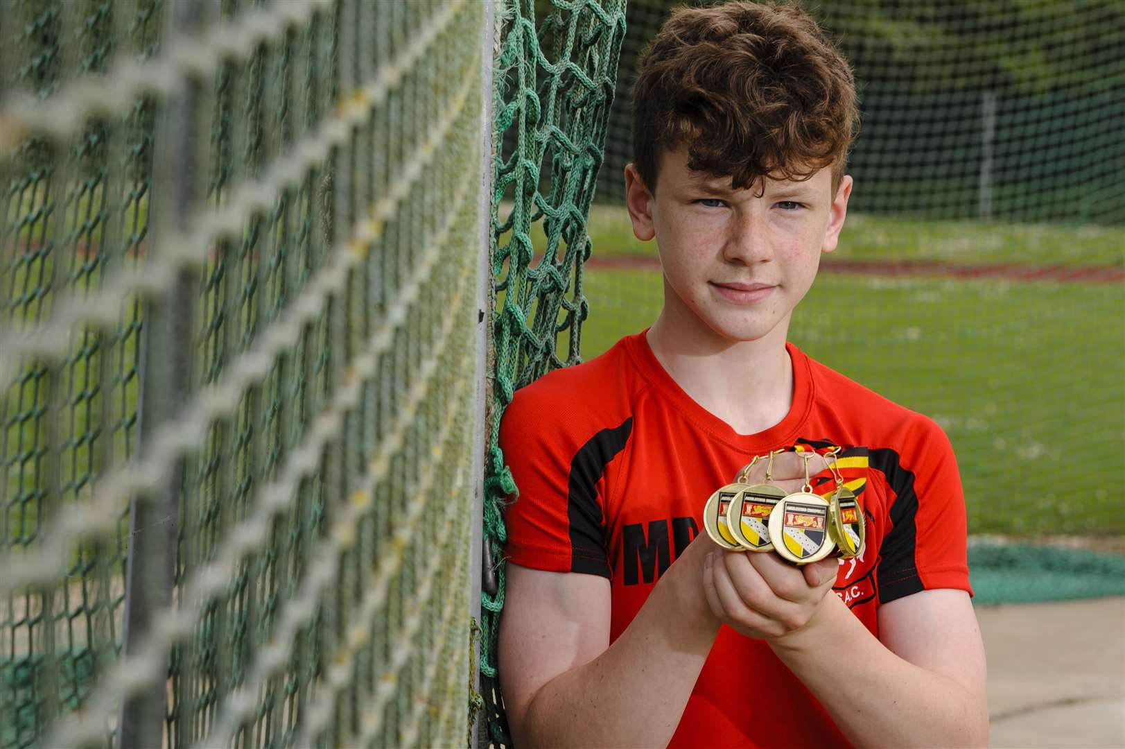 Max Brooke with his four medals at county athletics championships...Picture: Mark Bullimore Photography. (11856907)