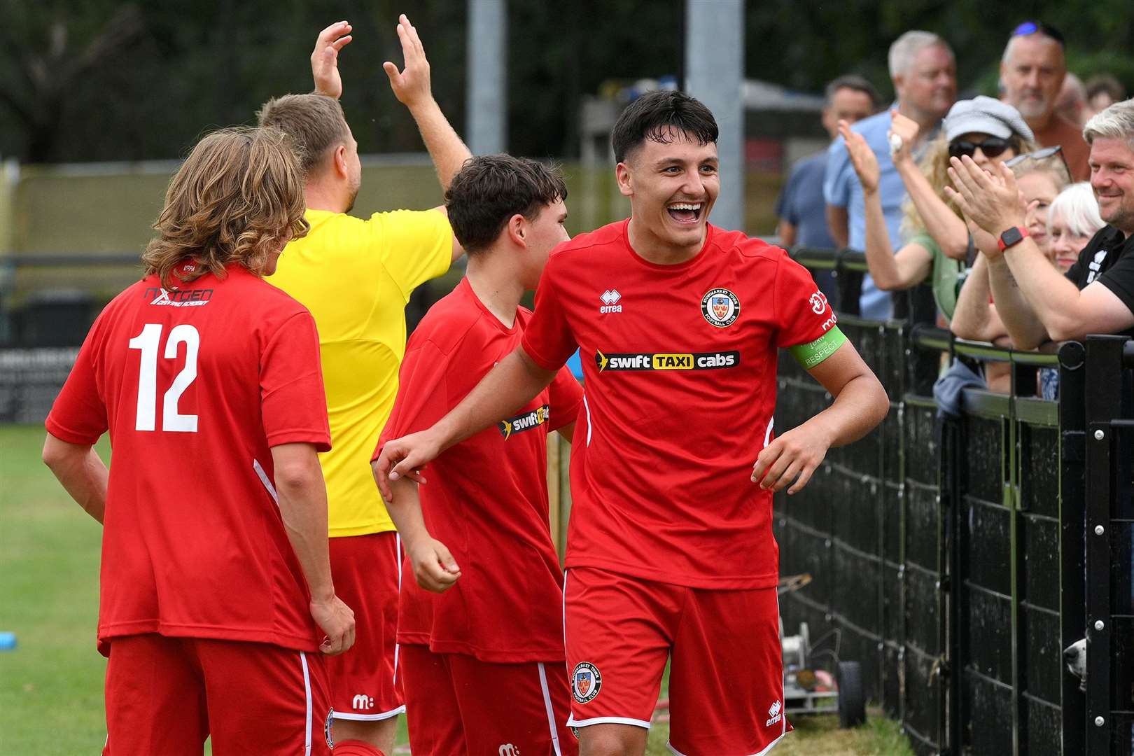 Stowmarket Town goalscorer Reece Langridge is all smiles at the final whistle. Picture: Mecha Morton