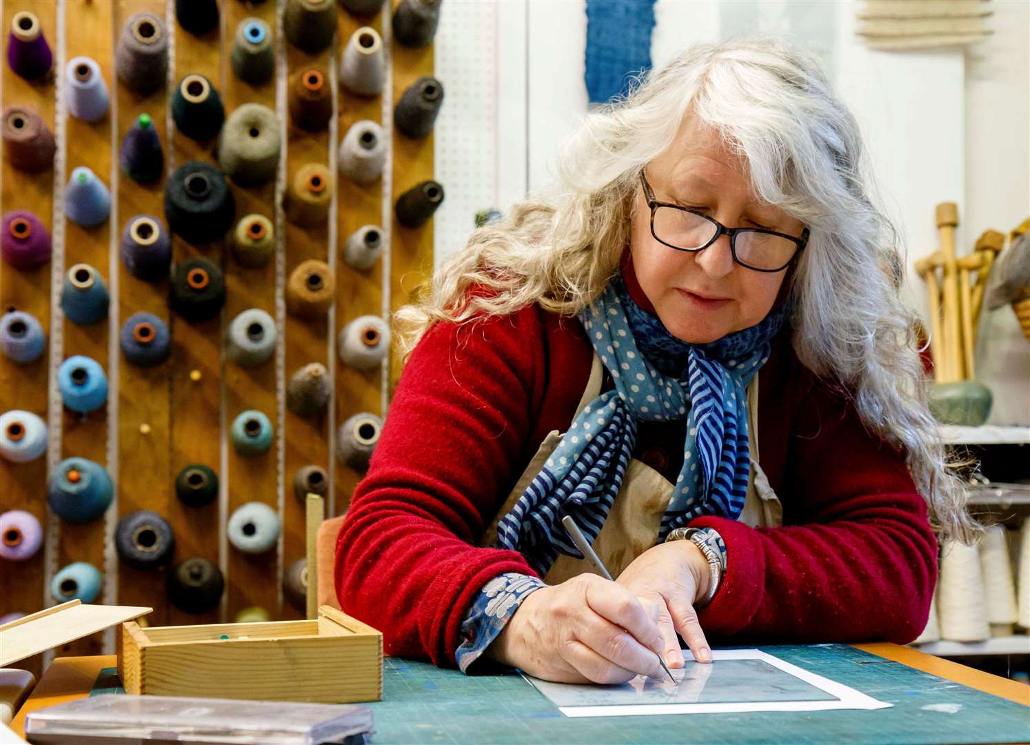 Annette Rolston demonstrates dry-point engraving.