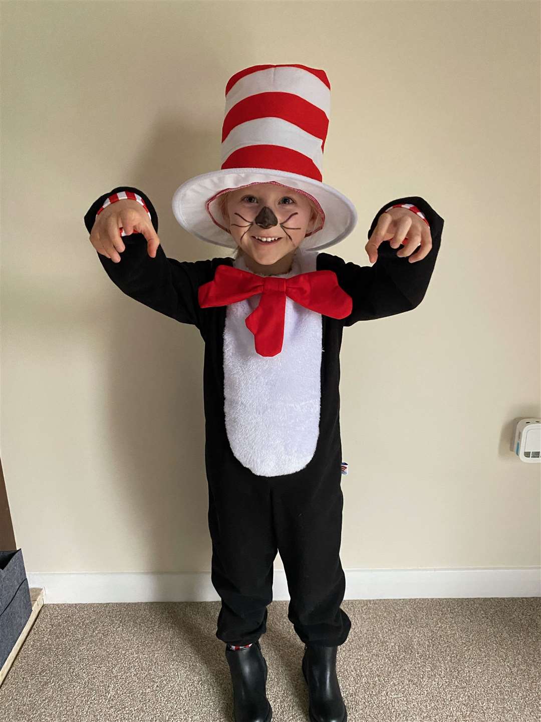 Isla woods, four, from Roydon, as The Cat in the Hat.