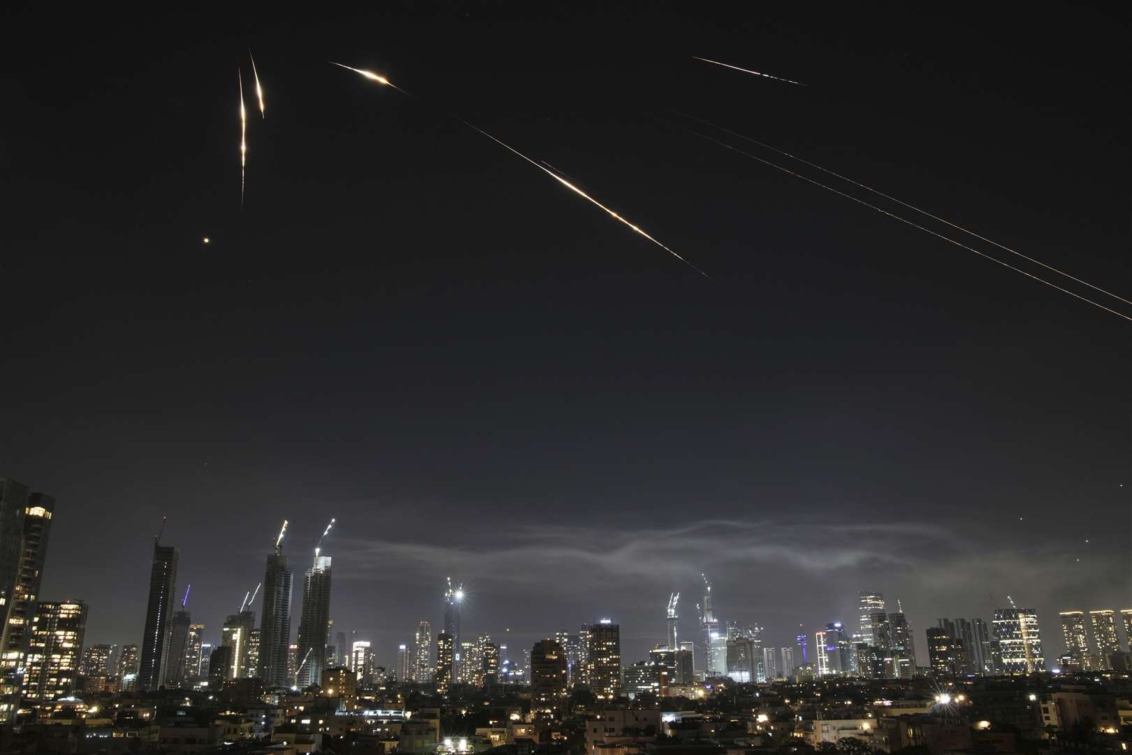 Israeli’s Iron Dome air defence system fires to intercept missiles over Tel Aviv, Israel (Leo Correa via AP)